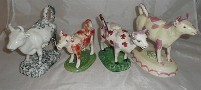 Lot 48 - Four assorted pottery cow creamers
