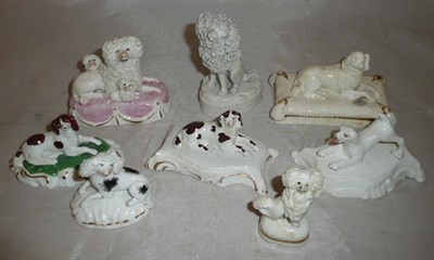 Lot 56 - Eight pottery and porcelain Poodle and Spaniel figures, all 19th century