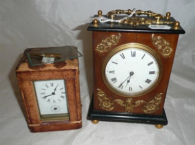 Lot 63 - A 19th century French carrying time piece and a brass carriage clock (2)