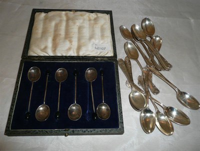 Lot 70 - A set of nine silver spoons with Rococo scroll detail, by Elkington & Co, Birmingham; set of...