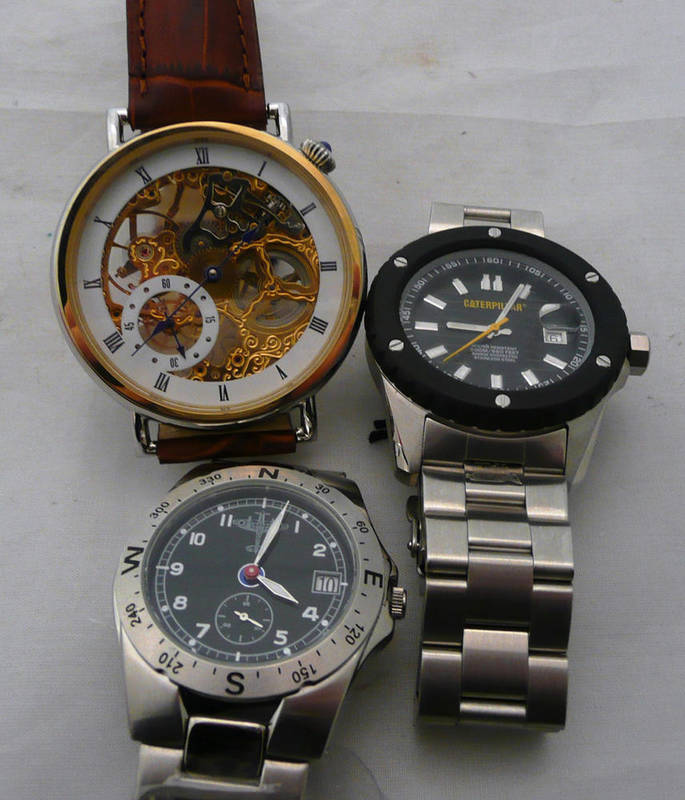 Lot 152 - An Ingersol wristwatch with skeleton movement, a Caterpillar wristwatch and a Defender of the Skies