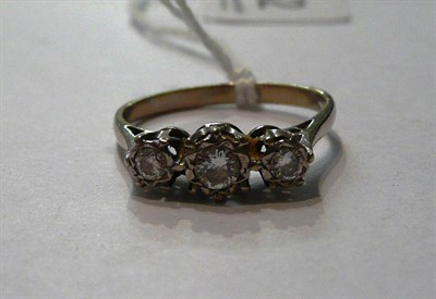 Lot 162 - A diamond three stone ring, stamped 18ct