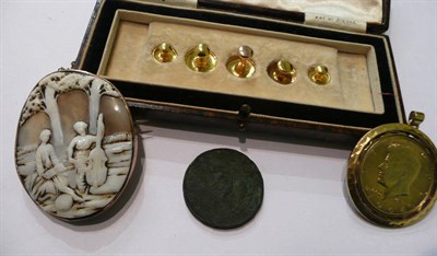 Lot 176 - Two yellow metal necklaces, a set of dress studs marked 9ct, a silver gilt half dollar, a cameo and