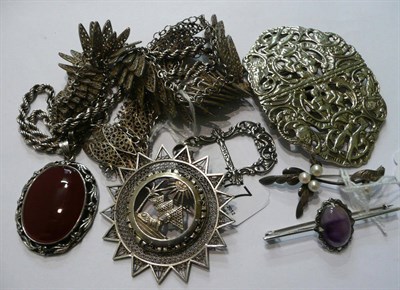 Lot 177 - A filigree necklace, an Egyptian motif brooch, a silver buckle, an EPNS buckle, a silver pendant on