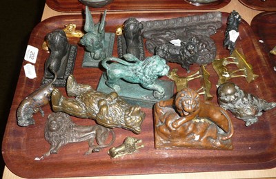 Lot 202 - A group of seventeen metal / metallic coated animals, predominantly lions, 19th/20th century