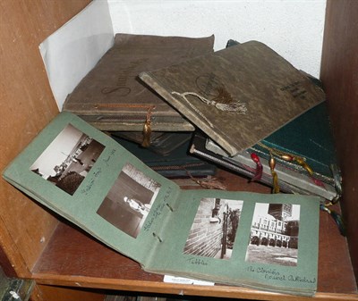 Lot 215 - Ten assorted photograph and postcard albums