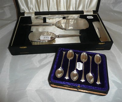 Lot 233 - A cased set of silver dressing table brushes and six cased silver teaspoons