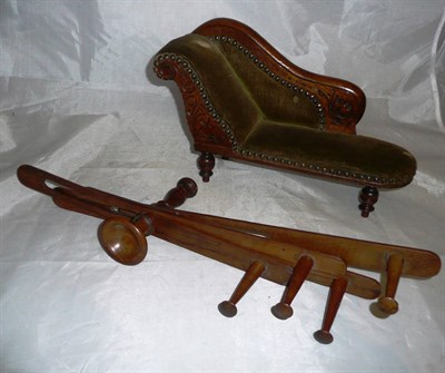 Lot 240 - Apprentice made carved miniature velvet upholstered chaise longue and a treen wool winder (2)