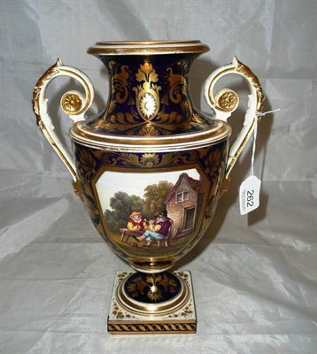 Lot 262 - A 19th century Derby twin handled vase with a painted vignette depicting two figures