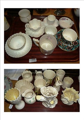 Lot 268 - A collection of twelve items of Belleek china including cups, vases etc