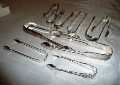 Lot 285 - Ten pairs of silver sugar tongs