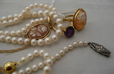 Lot 289 - A 9ct gold cameo pendant on a rope twist chain, a cameo ring, a 9ct gold amethyst ring, a...