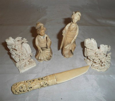 Lot 292 - Five pre-1947 ivory items; groups, figures and knife