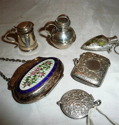 Lot 295 - A collection of novelty silver including a miniature tankard, miniature measure, enamelled...