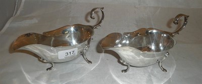 Lot 317 - Pair of silver sauceboats