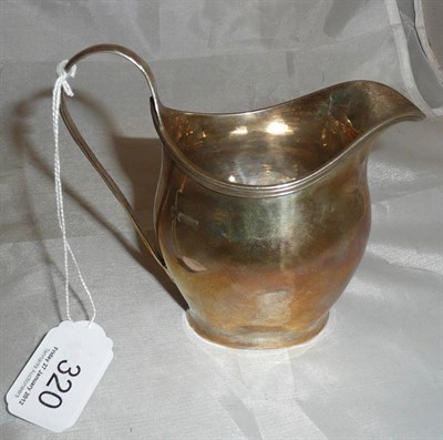 Lot 320 - A silver helmet cream jug, Chester, maker's mark - GN over HH