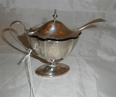 Lot 326 - A Georgian silver pedestal mustard with liner and spoon