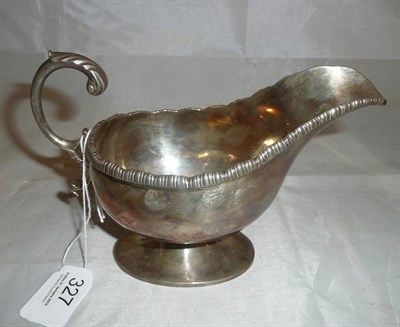 Lot 327 - A silver sauce boat, London, maker's mark - EJH over H?