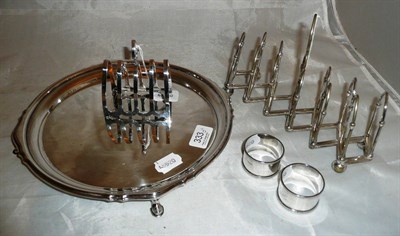 Lot 333 - Pair of silver napkin rings, silver toast rack, plated extending toast rack and a plated salver