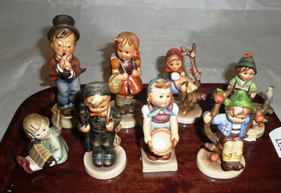 Lot 337 - Eight Hummel figures