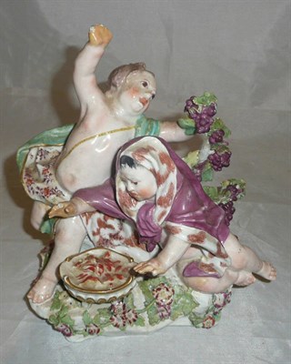 Lot 351 - An 18th century Chelsea porcelain figure group, gold anchor mark