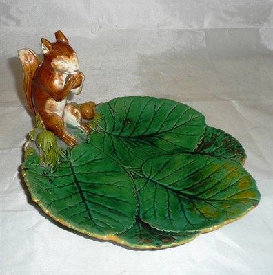 Lot 357 - A Minton Majolica 'squirrel' nut/strawberry dish (a.f.)