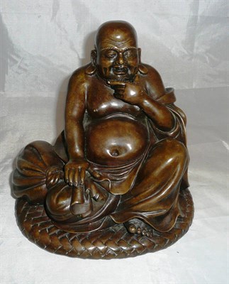 Lot 368 - A patinated bronze Buddha