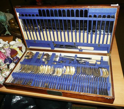 Lot 373 - An oak cased twelve-setting canteen of plated flatware