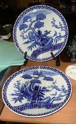 Lot 377 - A pair of Japanese porcelain chargers with typical blue and white decoration