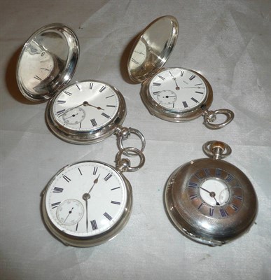 Lot 381 - Two silver full hunter pocket watches, silver half hunter and a silver open faced pocket watch, (4)