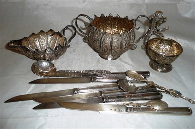 Lot 387 - A collection of white metal flatware, bowls, model owl etc