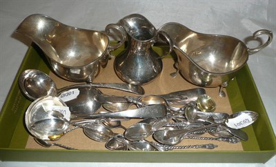 Lot 388 - A collection of Georgian and later flatware etc