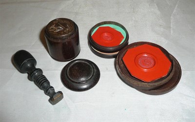 Lot 390 - Two cased wax seals, a metal seal and a small hand seal (4)