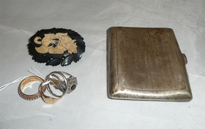 Lot 395 - Two 9ct gold rings, a silver cigarette case, a jet brooch and two rings