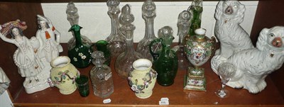 Lot 408 - A pair of Staffordshire dogs, a Staffordshire group, an urn, a glass, six decanters, green...