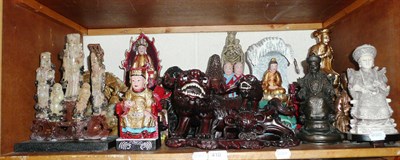 Lot 410 - A shelf of decorative ornaments, carvings and figures