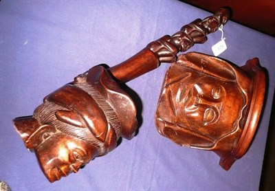 Lot 426 - A 19th century carved fruitwood wall bracket in the form of a nun, and another wooden carving