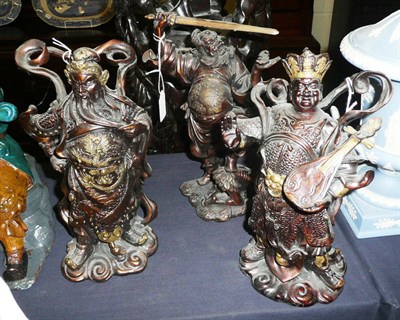 Lot 431 - Three patinated bronze figures