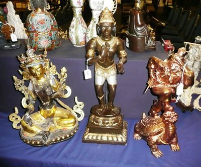 Lot 447 - A painted bronze Buddha and two others of half-human, half-monkey deities