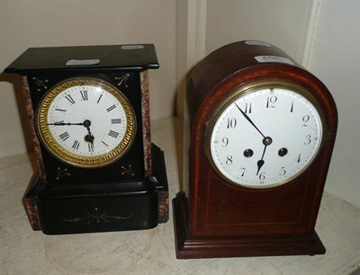 Lot 456 - A Belgian black slate mantel clock and an Edwardian mahogany mantel clock