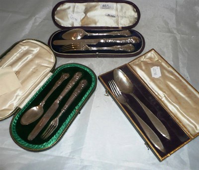 Lot 461 - Two silver christening sets and another white metal example (incomplete)