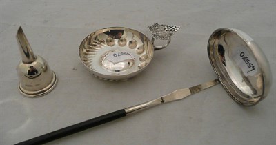 Lot 471 - A silver wine taster, a silver funnel and a Georgian silver toddy ladle