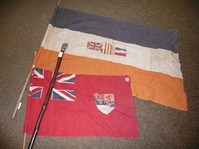 Lot 491 - Two flags and walking cane with pewter dog head pommel