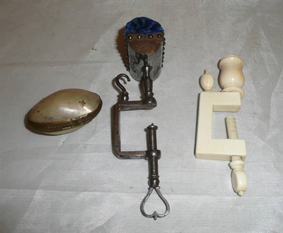 Lot 492 - Steel netting clamp, ivory clamp and mother of pearl purse