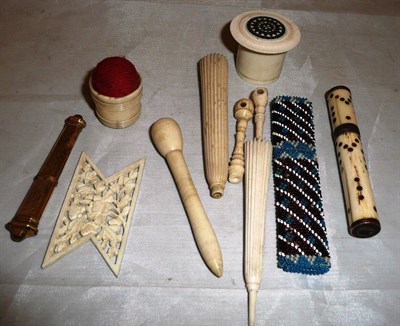 Lot 498 - Beadwork, ivory and bone needle cases