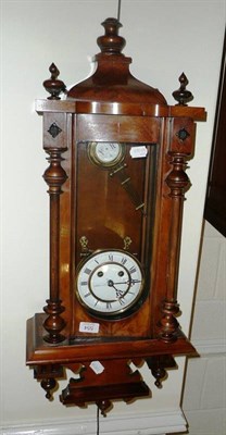 Lot 554 - A walnut cased spring driven Vienna wall clock