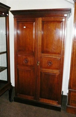 Lot 558 - An Edwardian walnut wardrobe with fitted interior