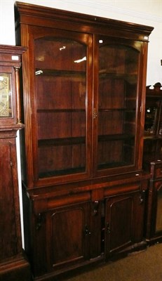 Lot 564 - A glazed Victorian mahogany bookcase (associated top)