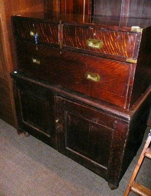 Lot 570 - 19th century brass bound oak campaign chest on cupboard base