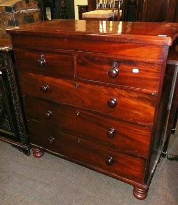 Lot 584 - A Victorian mahogany four height chest of drawers with secret frieze drawer